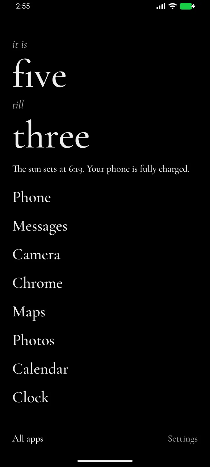 The same home in the dark theme, with the clock in words: “it is five till three”.